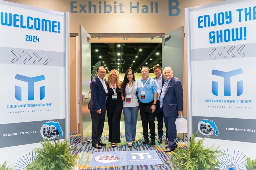 FLA members welcoming attendees to the Florida Luxury Transportation Show